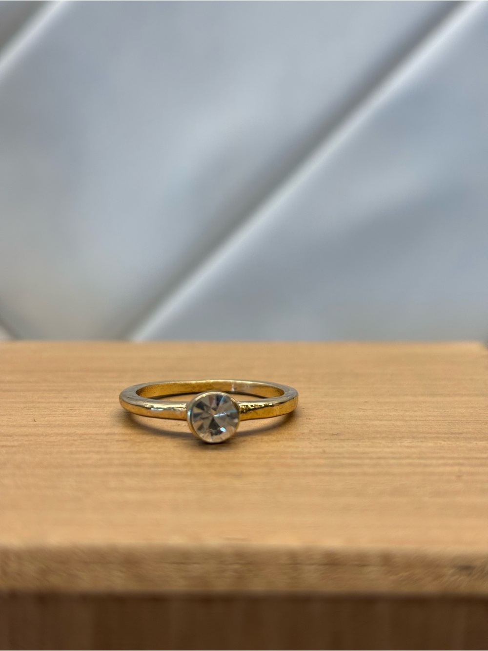 Gold-Tone Solitaire Ring with Clear Crystal Accent
